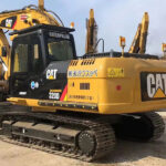 CAT 320D excavator with high performance, ideal for construction projects, featuring a powerful engine.