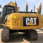CAT 320D excavator with high performance, ideal for construction projects, featuring a powerful engine.