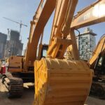 CAT 325B excavator showcasing specs, weight, and performance.