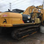 CAT 330 and CAT 320D excavators, showcasing UHD specs and various used options.