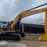 CAT 330 and CAT 320D excavators, showcasing UHD specs and various used options.