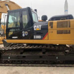 CAT 330 and CAT 320D excavators, showcasing UHD specs and various used options.